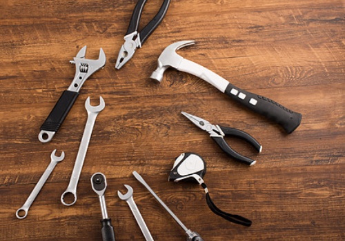 Bi-material molded handle for comfort and grip