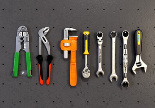 Bi-material molded handle for comfort and grip